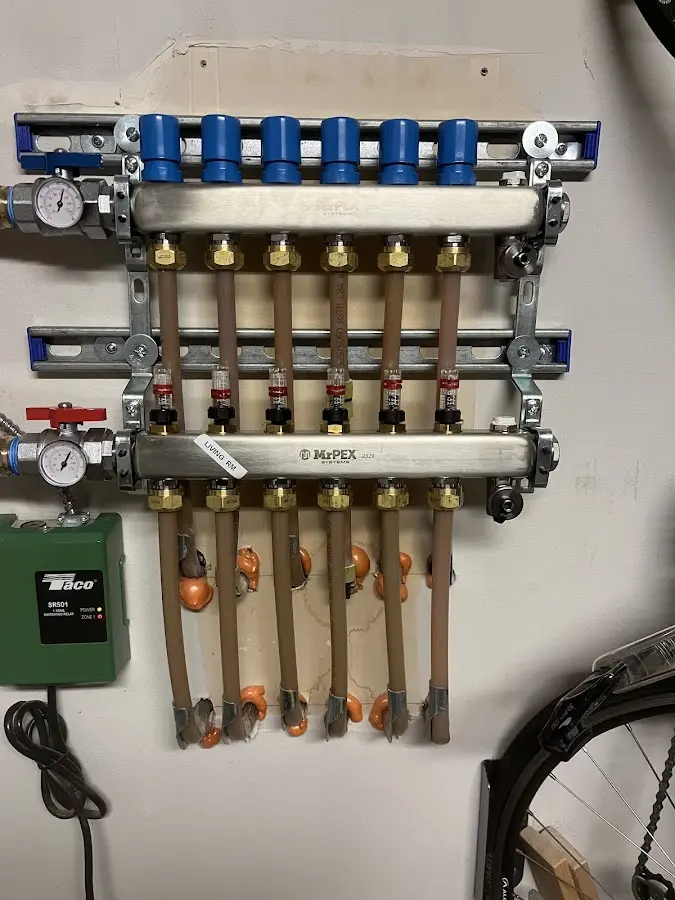 Plumber performing Water Heater Repair at a residential property in Silt